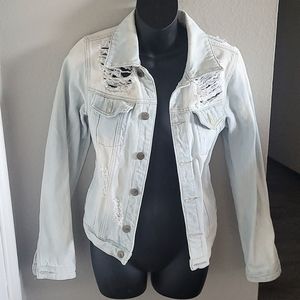 Fashion nova light blue distressed Jean jacket.